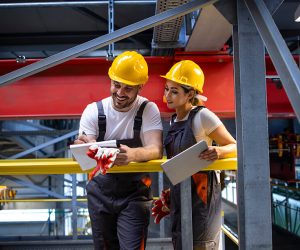 factory-workers-protective-equipment-standing-production-hall-sharing-ideas-1-1